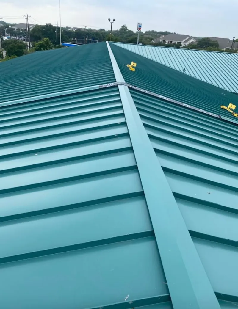 Green commercial metal roof ridge and valley for Metal Roof Repair in Henniker