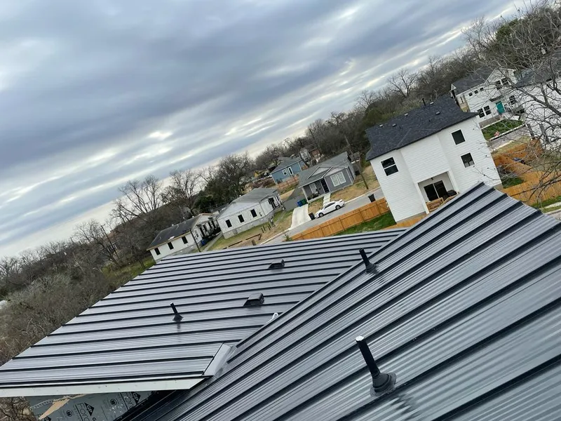Standing seam metal roof panels with vents for Skylight Repair in Henniker